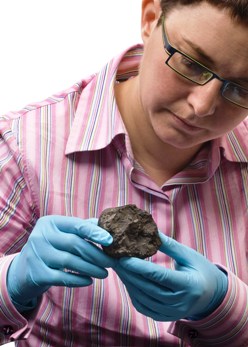 Dr Caroline Smith, meteorite curator at the NHM, with the Ivuna meteorite